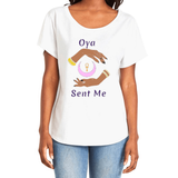 Feel the magic of wearing this women's comfortable white T-Shirt with the name of the West African goddess Oya, and the message - "Oya Sent Me" in dark purple letters. It has brilliant graphics of hands circling a new moon with an ankh. Fabric laundered for relaxed fit.