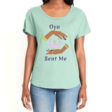 Feel the magic of wearing this comfortable mint green women's T-Shirt with the name of the West African goddess Oya, and the message - "Oya Sent Me" in dark purple letters. It has brilliant graphics of hands circling a new moon with an ankh. Fabric laundered for relaxed fit.