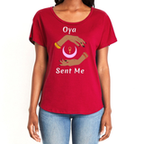 Feel the magic of wearing this dark red comfortable women's T-shirt with the name of the West African goddess Oya, and the message - "Oya Sent Me" in white letters. It has brilliant graphics of hands circling a new moon with an ankh. It is fabric laundered for relaxed fit.