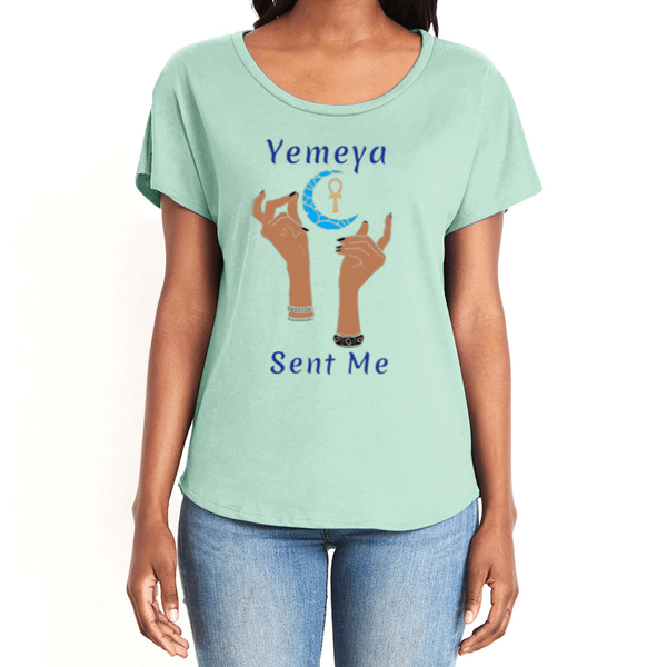 Show your true power in this magical women's mint green T-shirt with the name of the West African goddess Yemeya, and the message "Yemeya Sent Me" in dark blue letters. It also has a brilliant graphic of hands reaching upwards to a new moon and an ankh. It is fabric laundered for relaxed fit.